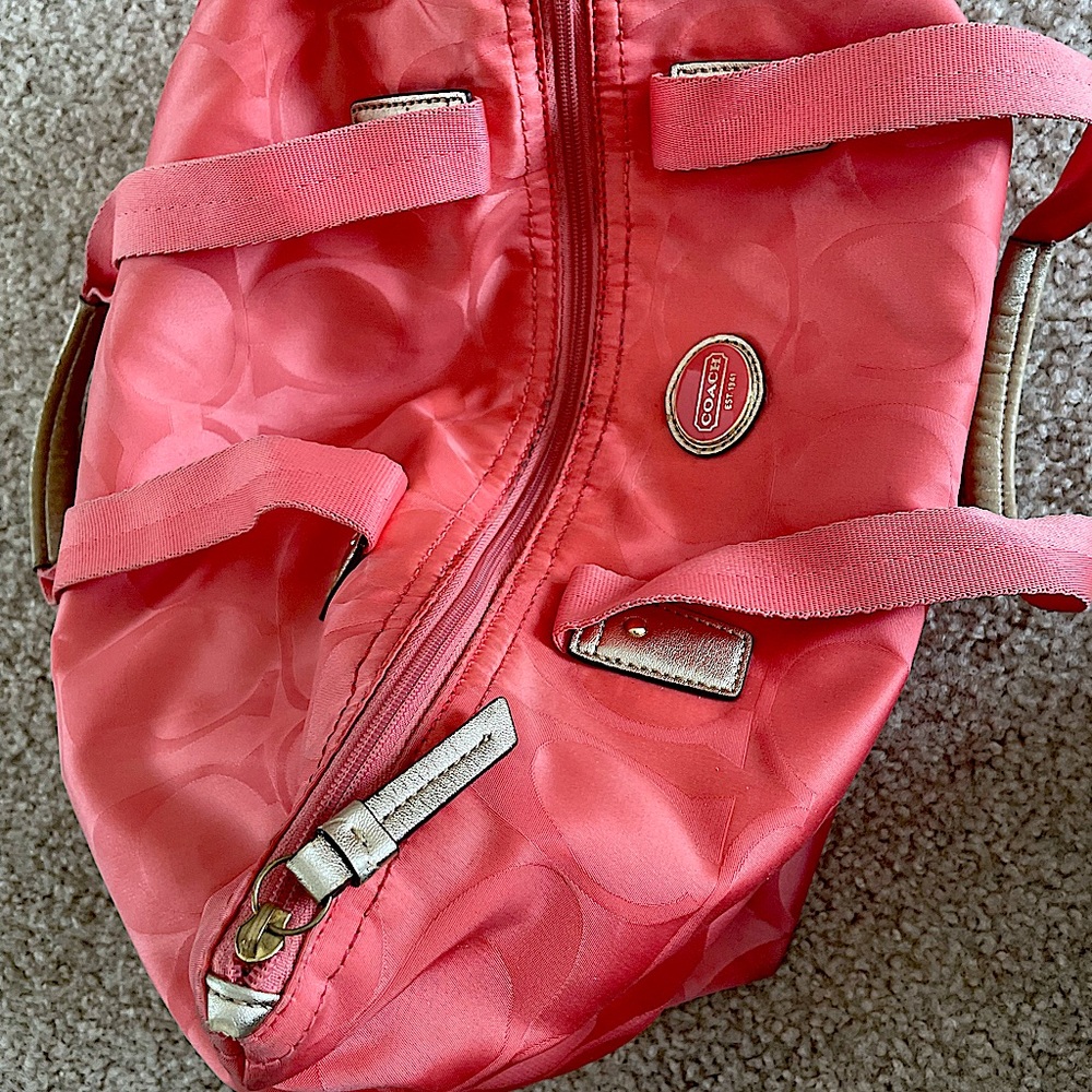 Pink Coach tote/weekend bag with gold highlights